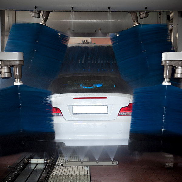 car getting automatic washed